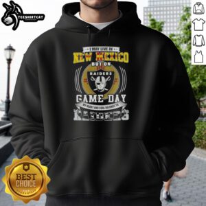 Man wearing an 'I May Live In New Mexico But My Heart Belongs To Las Vegas Raiders' hoodie, showcasing team pride.