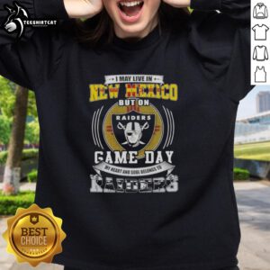 Alt Text: Comfortable sweatshirt featuring 'I May Live in New Mexico, But My Heart Belongs to Las Vegas Raiders' design.