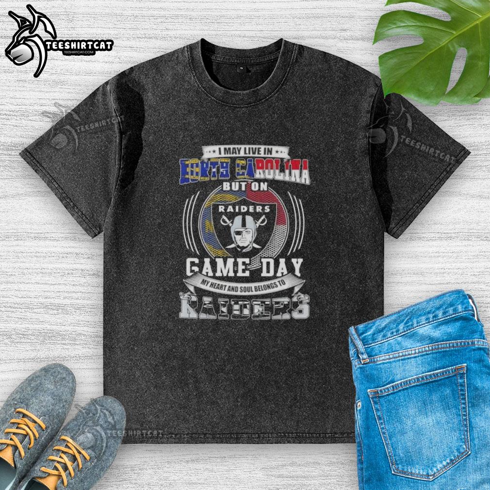 Washed t-shirt featuring 'I May Live In North Carolina But On Game Day My Heart Belongs To Las Vegas Raiders' design.