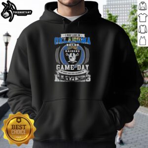 Alt Text: Person wearing 'I May Live In Oklahoma But On Game Day My Heart Belongs To Las Vegas Raiders' hoodie