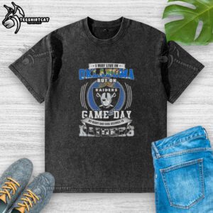 Washed t-shirt featuring 'I May Live In Oklahoma But On Game Day My Heart Belongs To Las Vegas Raiders' design.