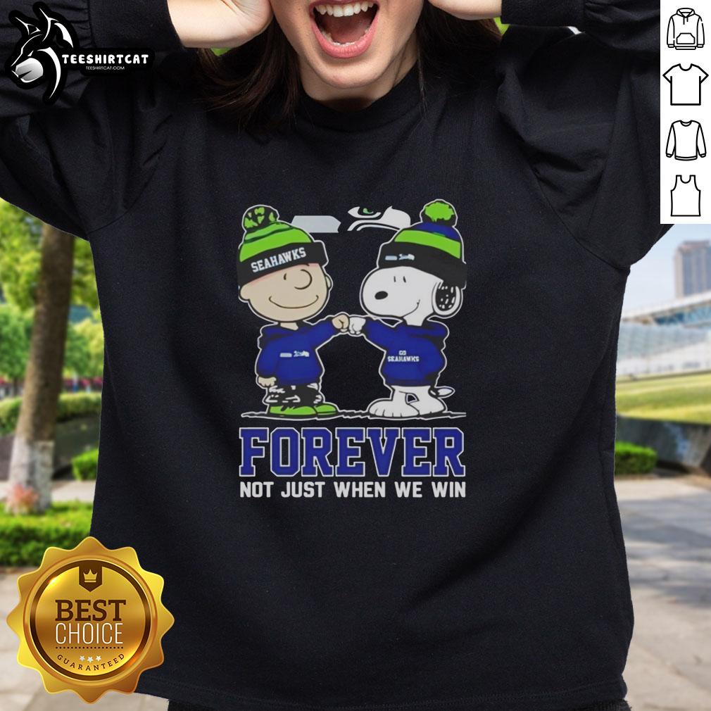 Original Peanut Snoopy and Charlie Brown Seattle Seahawks sweatshirt, perfect for fans celebrating team spirit year-round.