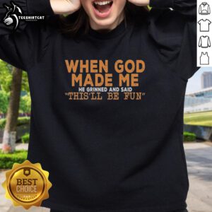 Original sweatshirt featuring the quote 'When God Made Me He Grinned And Said' in stylish typography.