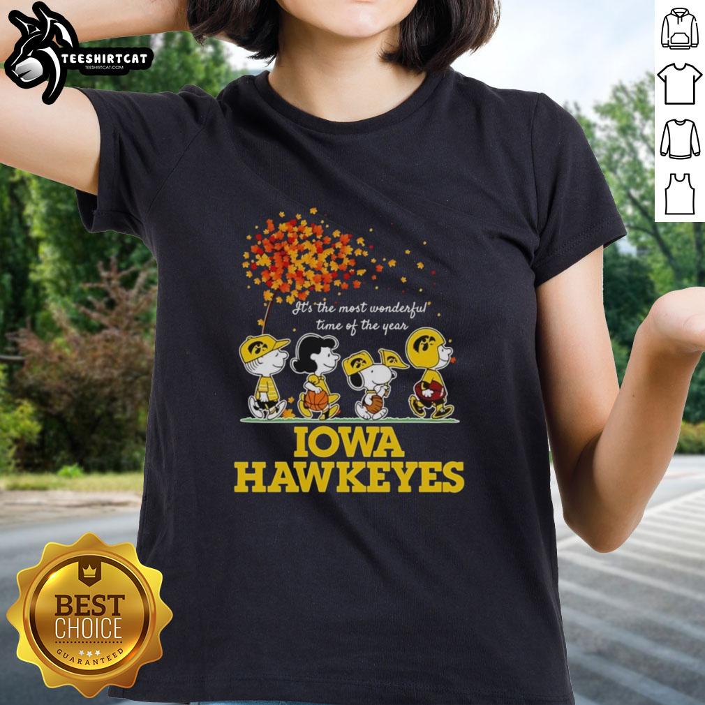 Premium Charlie Brown Sally Brown Snoopy Woodstock Iowa Hawkeyes tee for ladies celebrating the most wonderful time.