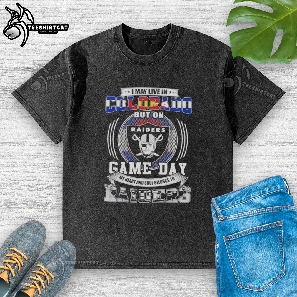 Premium washed t-shirt featuring 'I may live in Colorado, but my heart belongs to Las Vegas Raiders football' design.