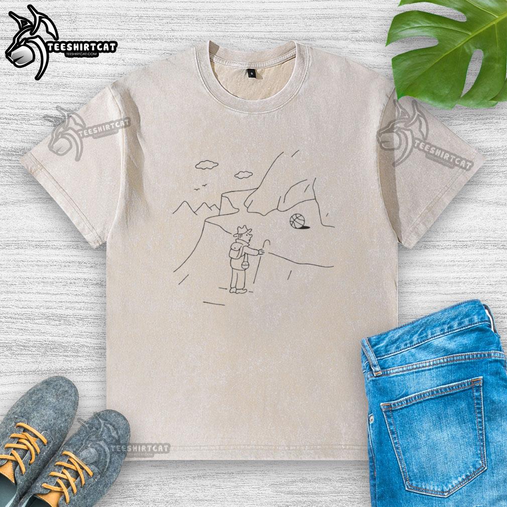 Premium Life Coach Mountain Climber Sketch on Washed T-Shirt, showcasing an inspiring design for outdoor enthusiasts.