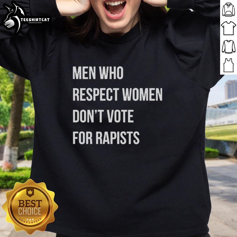 Premium sweatshirt featuring 'Men Who Respect Women Don't Vote for Rapists' message, promoting respect and awareness.