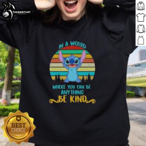 Retro sweatshirt featuring the phrase 'Be Kind' with a pretty stitch design, perfect for casual style.