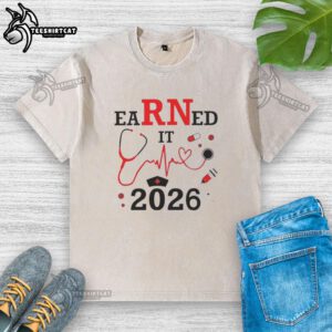 Top Earned It RN Registered Nurse 2026 washed t-shirt featuring a stylish design for proud nurses.