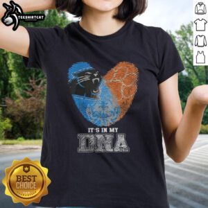 Carolina Panthers x Clemson Tigers ladies tee featuring 'It's In My DNA' design and vibrant fingerprint graphics.