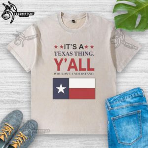 Top It's a Texas Thing Y'all Wouldn't Understand flag washed t-shirt with vibrant Texas flag design.