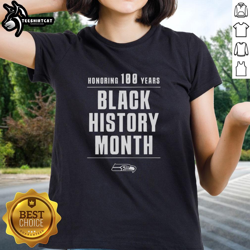 Seattle Seahawks ladies tee honoring 100 years of Black History Month with vibrant design and team logo.
