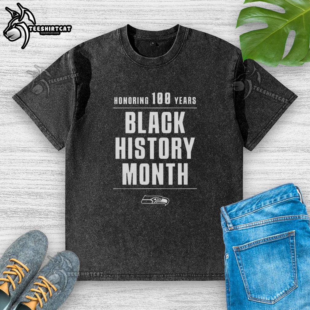Nice Seattle Seahawks honoring 100 years Black History Month washed t-shirt featuring team logo and vibrant colors.