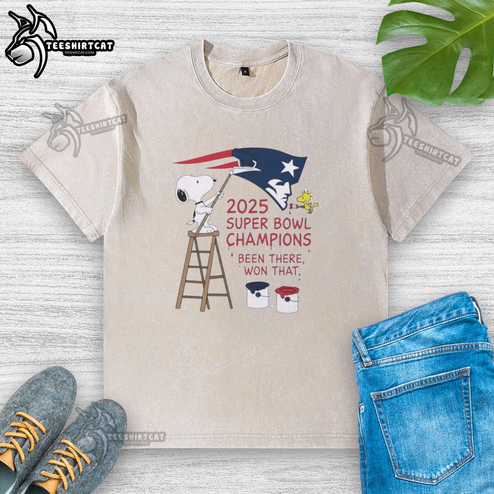 Snoopy and Woodstock celebrate New England Patriots 2025 Super Bowl Champions on a stylish washed t-shirt design.