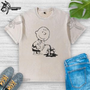 Official Charlie Brown political caricature on a washed t-shirt, featuring a fun and quirky design perfect for fans.