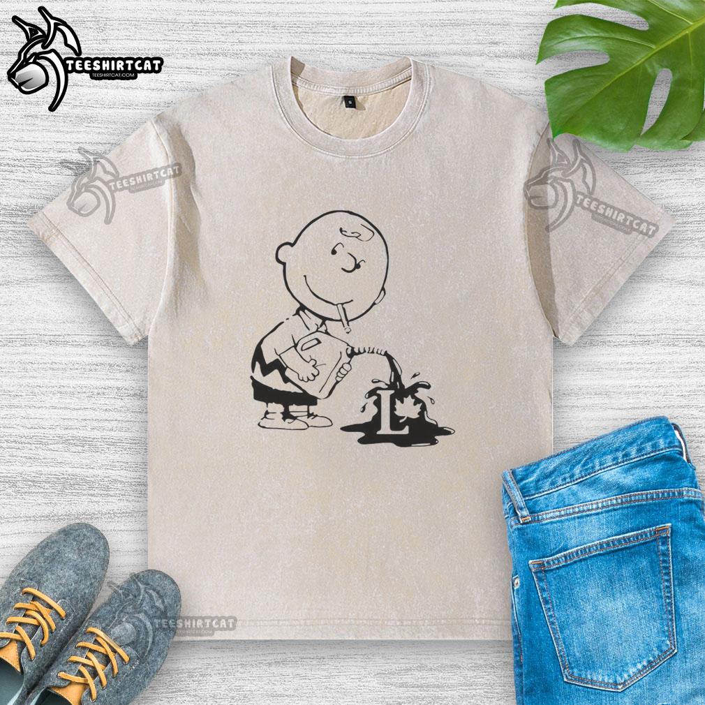 Official Charlie Brown political caricature on a washed t-shirt, featuring a fun and quirky design perfect for fans.