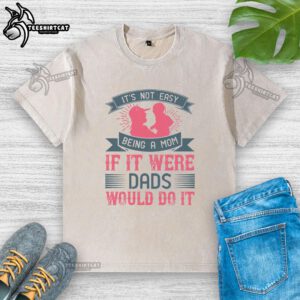 Official 'It's Not Easy Being a Mom' t-shirt for moms, featuring humorous quote about parenting challenges.