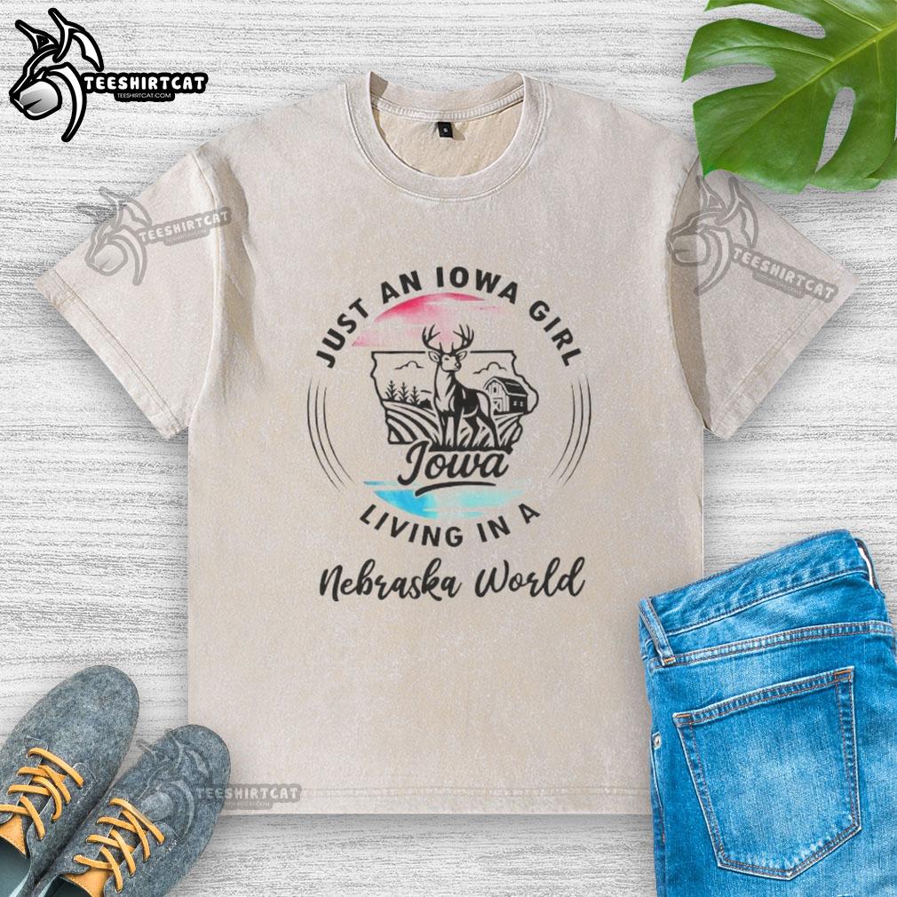 Alt Text: Official Just an Iowa Girl Living in a Nebraska World washed t-shirt showcasing Midwest pride and casual style.
