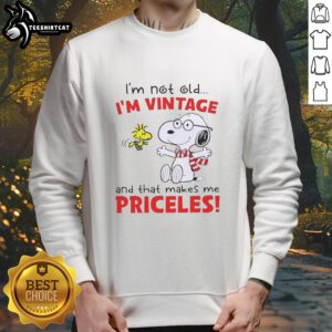 Official Peanuts Snoopy sweatshirt with 'I'm Not Old, I'm Vintage, and That Makes Me Priceless' design