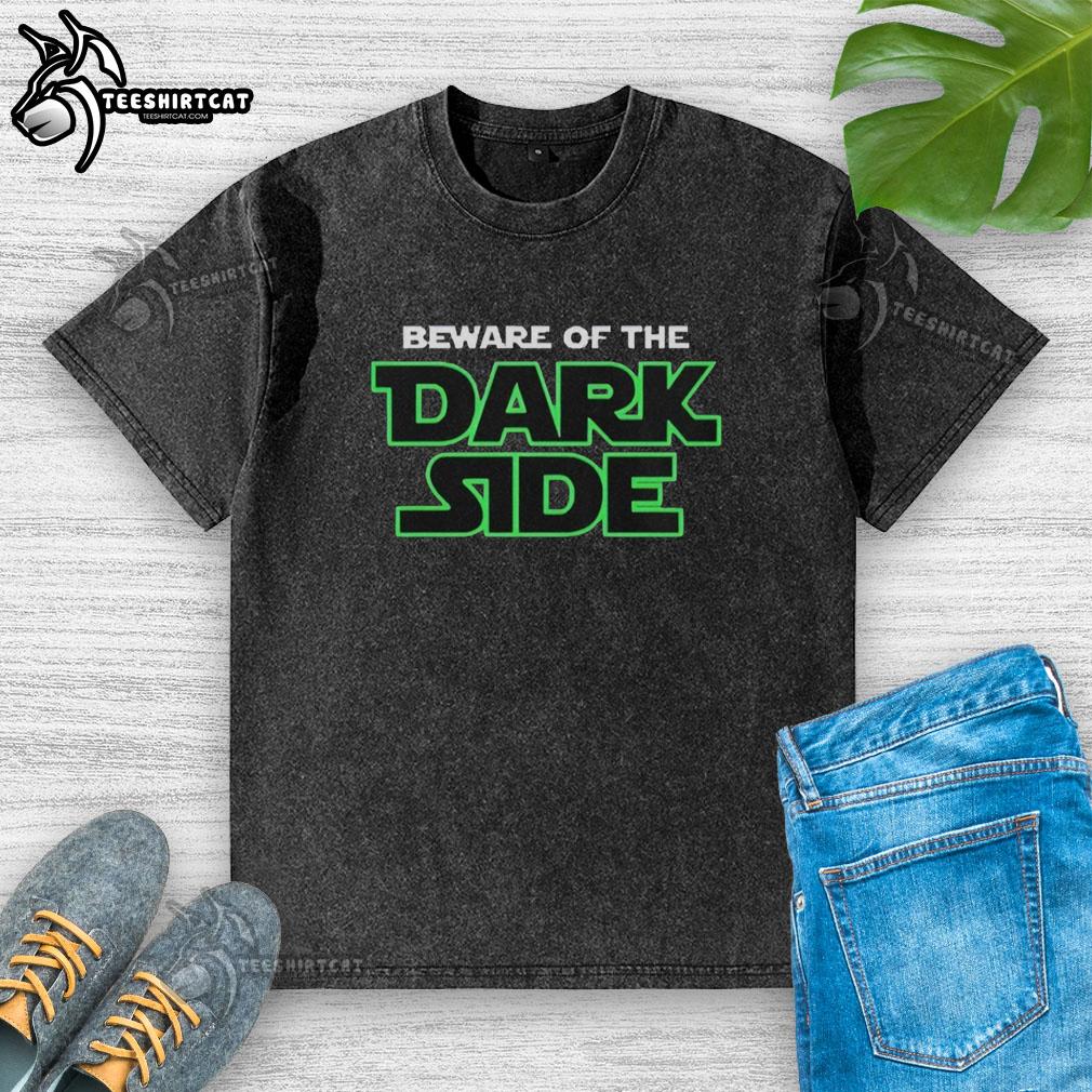 Alt Text: Official Seattle Seahawks Beware Of The Dark Side Washed T-Shirt featuring team logo and vintage design.