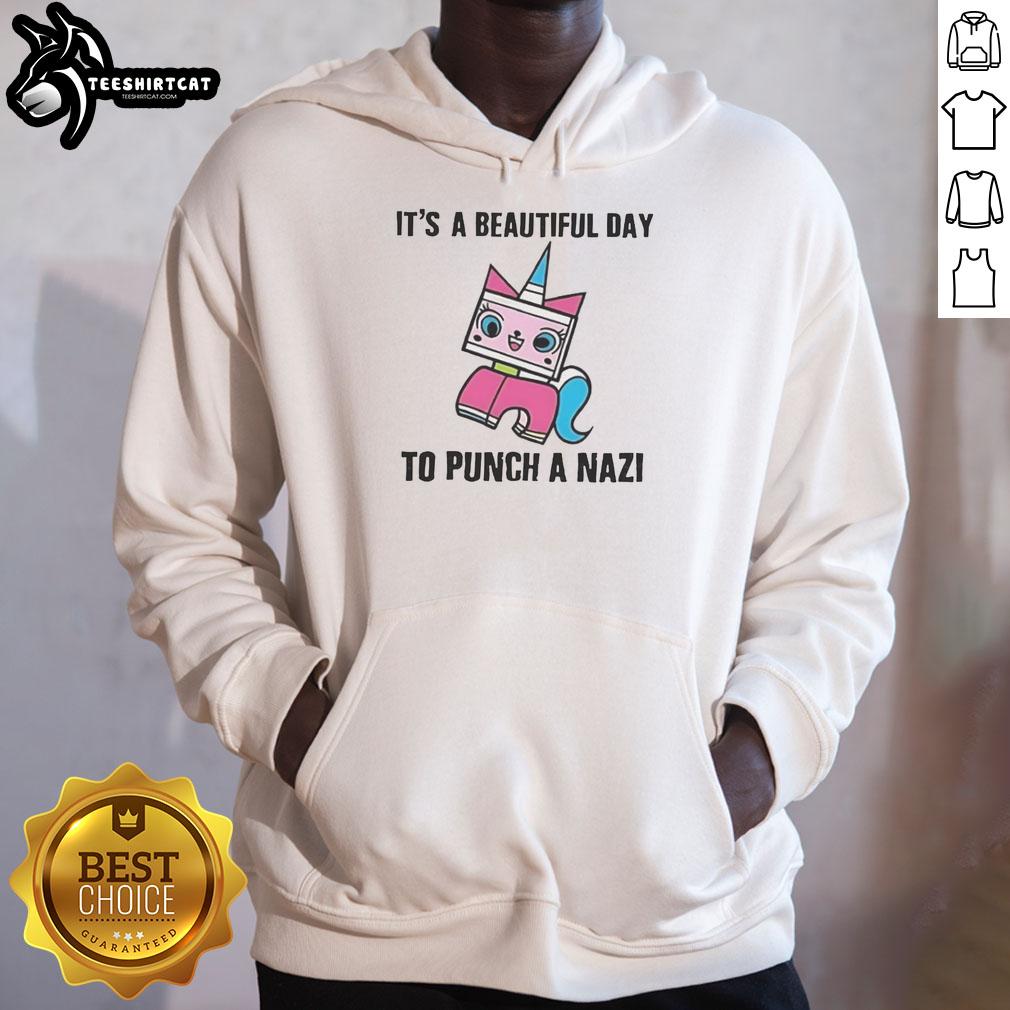 Colorful Unikitty hoodie featuring 'It's A Beautiful Day To Punch A Nazi' design, perfect for expressing bold statements.