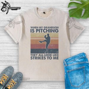 Vintage washed t-shirt featuring the phrase 'When My Grandson Is Pitching, They All Look Like Strikes To Me'.
