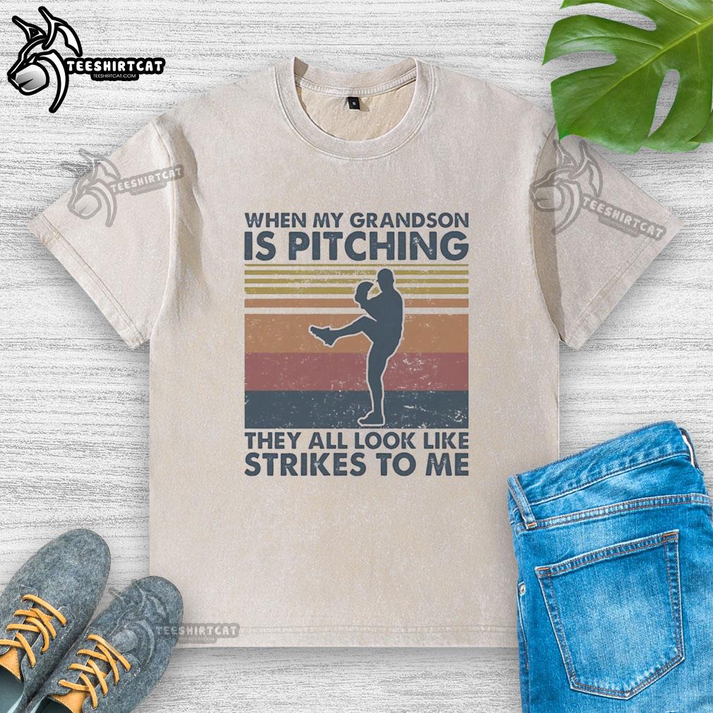 Vintage washed t-shirt featuring the phrase 'When My Grandson Is Pitching, They All Look Like Strikes To Me'.