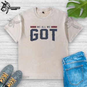 Premium New England Patriots We All We Got washed t-shirt in navy blue, perfect for fans showing team spirit.