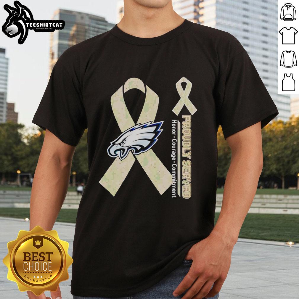 Premium Philadelphia Eagles T-Shirt featuring 'Proudly Served Honor Courage Commitment' design for fans and veterans.