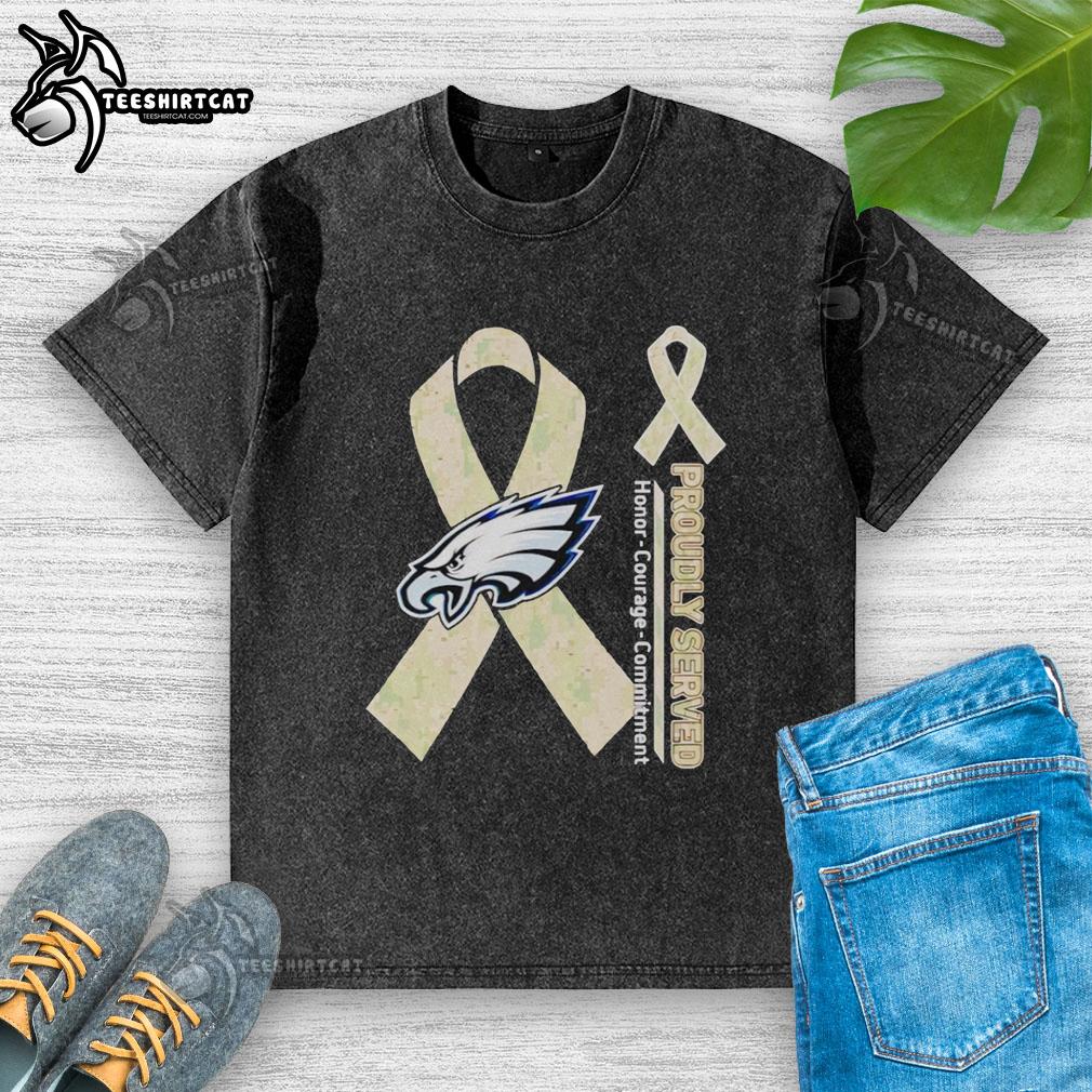 Alt Text: Premium Philadelphia Eagles t-shirt featuring 'Honor, Courage, Commitment' design, perfect for fans and supporters.