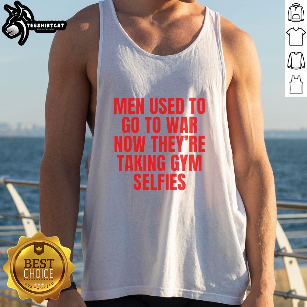 Man in tank top flexing in gym, embodying the phrase 'Good Men Used To Go To War, Now Theyre Taking Gym Selfies.'