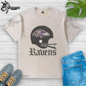 Baltimore Ravens football logo on a big helmet design featured on a washed t-shirt, perfect for fans.