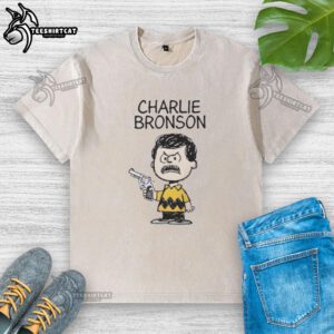 Stylish washed t-shirt featuring a Charlie Bronson action movie mashup design, perfect for film enthusiasts and casual wear.
