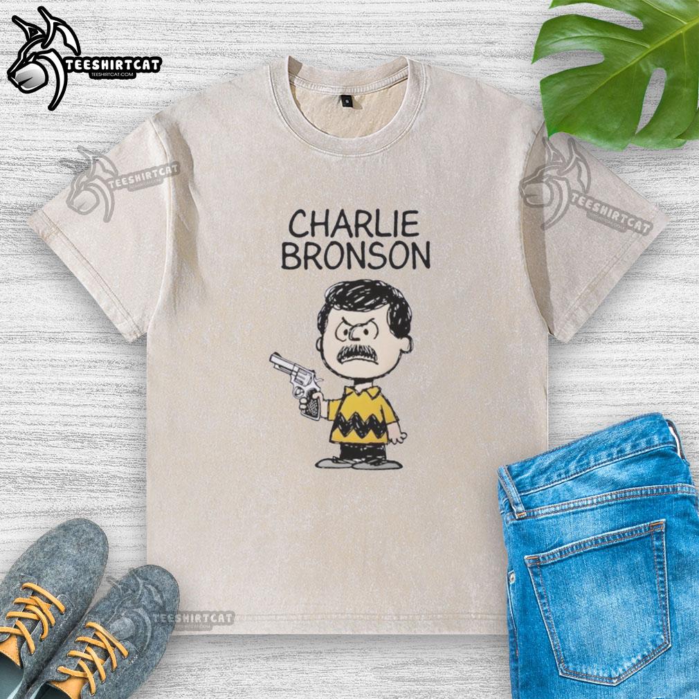 Stylish washed t-shirt featuring a Charlie Bronson action movie mashup design, perfect for film enthusiasts and casual wear.