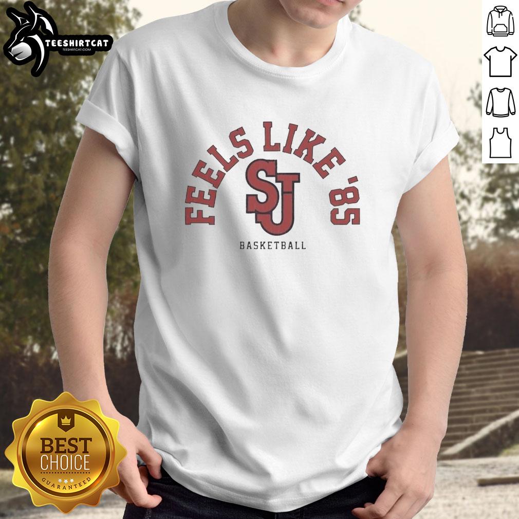 Alt Text: Nice St John's Red Storm NCAA Basketball '85 logo t-shirt featuring a vibrant design perfect for fans and collectors.