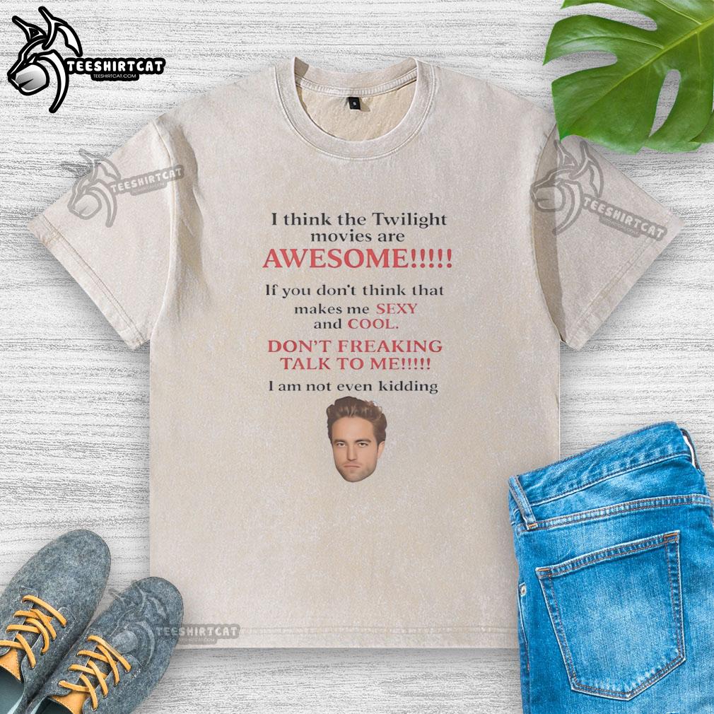 Robert Pattinson wearing a washed t-shirt, expressing his love for the Twilight movies in a casual setting.