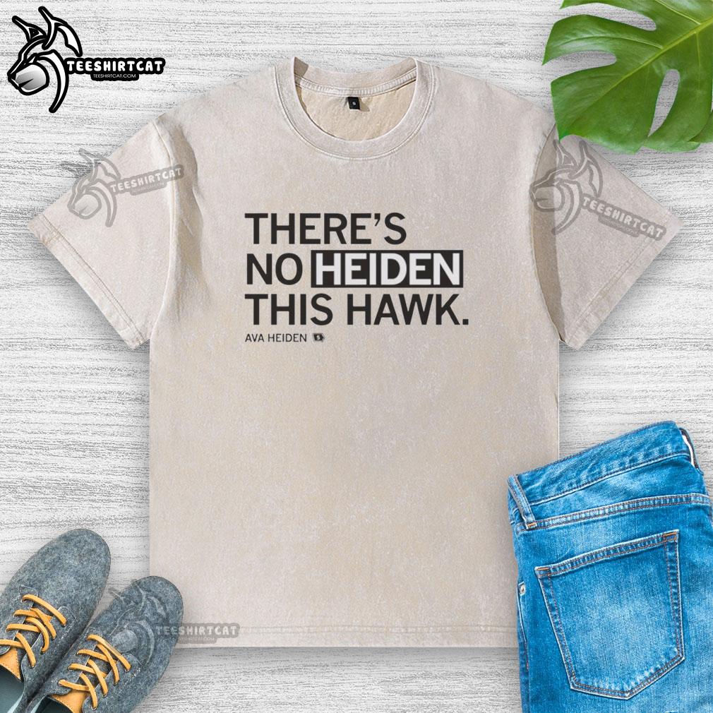 Official 'There's No Heiden This Hawk' Ava Heiden washed t-shirt displayed on a wooden background, showcasing its stylish design.