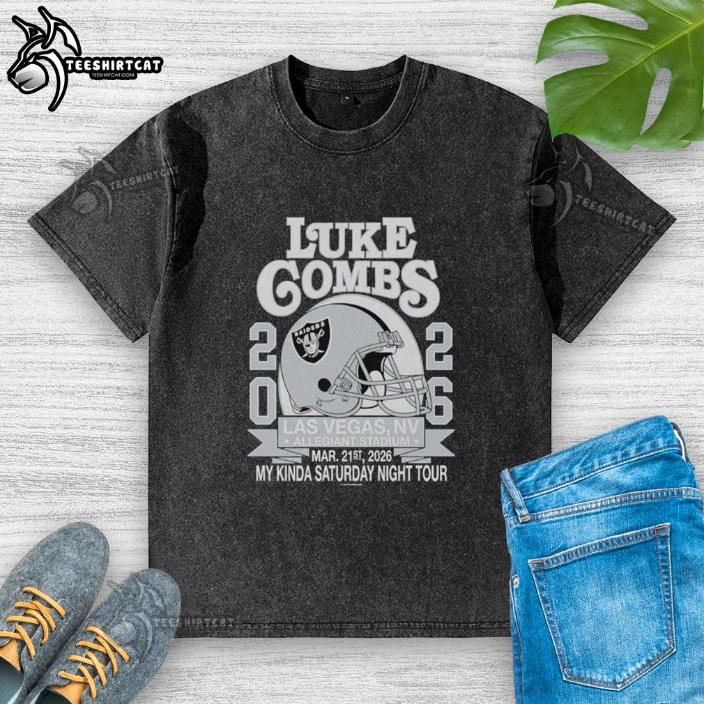 Alt Text: Premium Luke Combs Las Vegas 2026 tour merch featuring a Raiders helmet washed t-shirt at Allegiant Stadium.