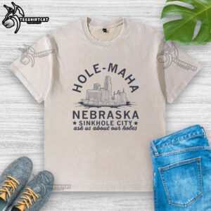 Pretty Hole Maha Nebraska Sinkhole City washed t-shirt featuring a unique, artistic design and vibrant colors.