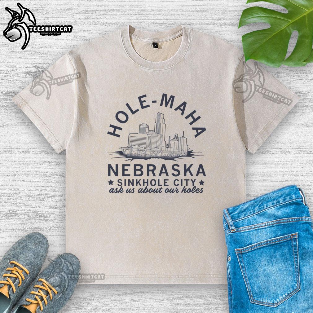 Pretty Hole Maha Nebraska Sinkhole City washed t-shirt featuring a unique, artistic design and vibrant colors.