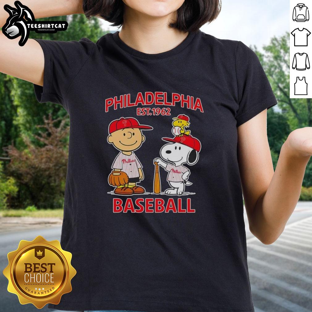 Awesome Charlie Brown and Snoopy Philadelphia Phillies basketball tee for ladies, established 1962, featuring vibrant graphics.