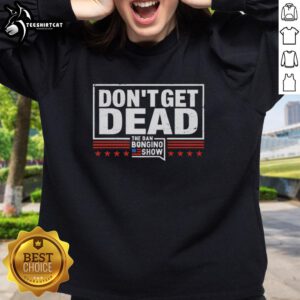 Alt Text: Retro 'Don't Get Dead' sweatshirt from The Dan Bongino Show, featuring bold graphics and a stylish design.