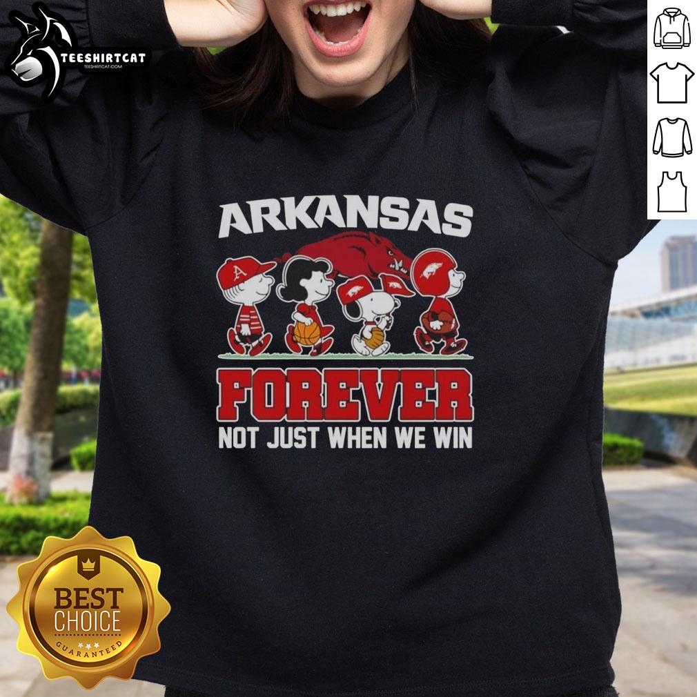 Awesome Peanuts x Arkansas Razorbacks sweatshirt featuring cartoon characters, perfect for die-hard fans year-round.