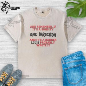 Vintage washed t-shirt featuring a quote about One Direction songs, highlighting Bager Lous' songwriting talent.