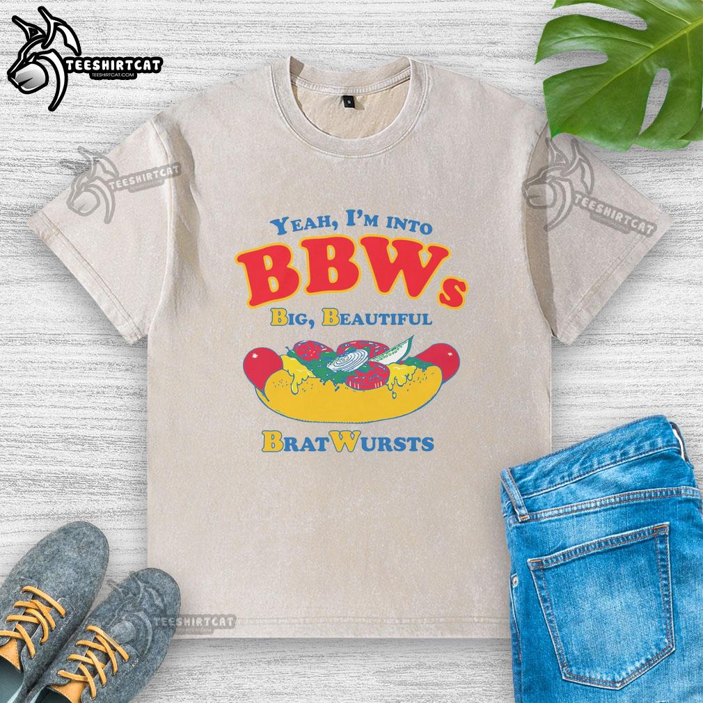 Person wearing 'Nice Yeah I'm Into BBWs' T-shirt featuring a fun bratwurst graphic, celebrating body positivity and humor.