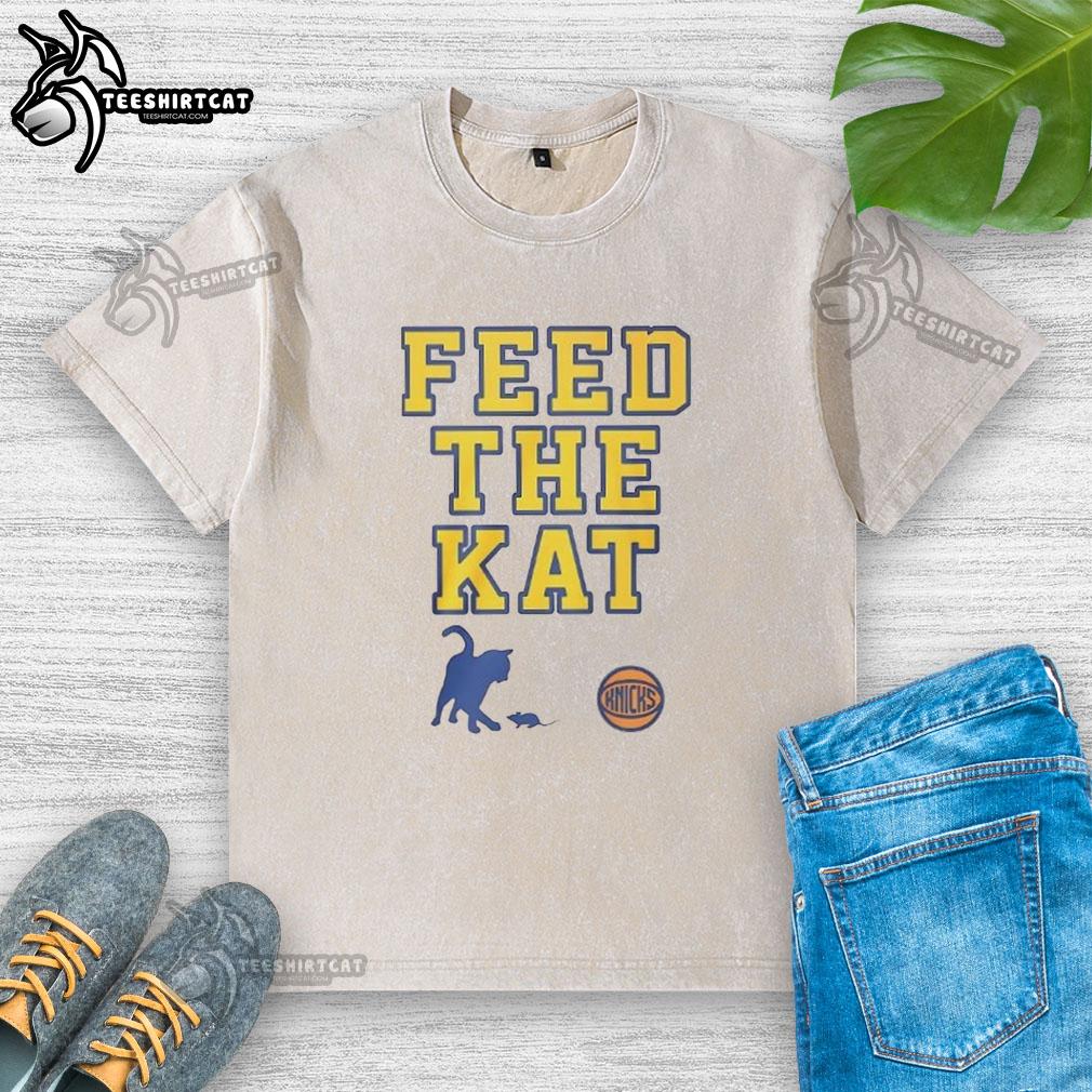 Official New York Knicks Feed The Kat Washed T-Shirt featuring vibrant team colors and a stylish, relaxed fit.