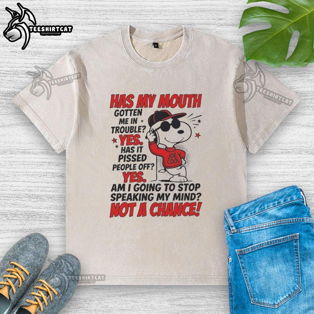Snoopy wearing a red hoodie with the text 'Has my mouth gotten me in trouble? Yes, it pissed people off' on a T-shirt.