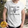 Alt Text: Premium cute ninja holding a katana on a stylish T-shirt, perfect for ninja fans and martial arts enthusiasts.