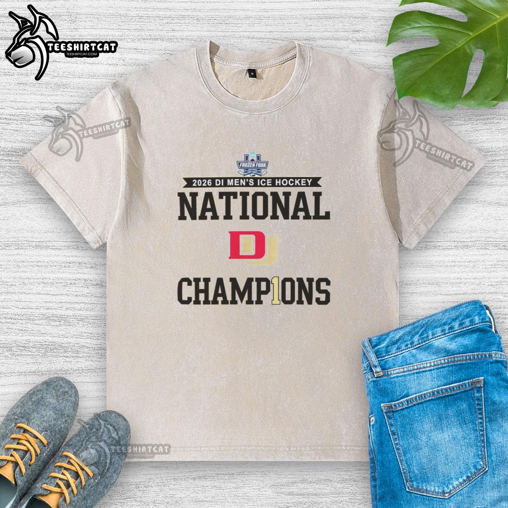 Premium Denver Pioneers 2026 Men's Ice Hockey Frozen Four Champions washed t-shirt showcasing team spirit and victory.