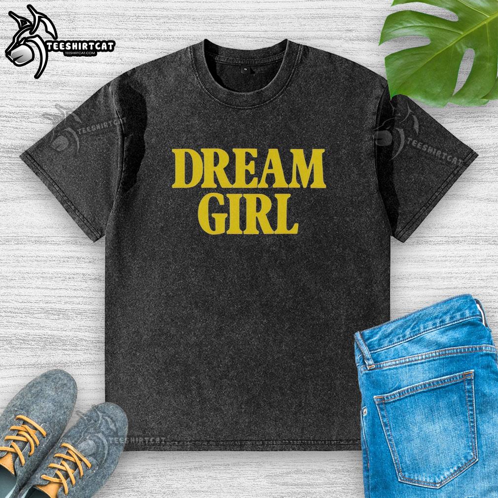 Pretty dream girl wearing a washed t-shirt, showcasing a casual and stylish look in a vibrant outdoor setting.